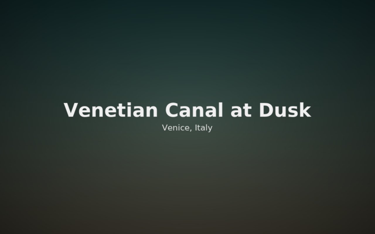 Gondola passing under a small stone bridge at dusk